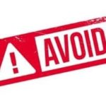 Warning symbol with 'AVOID' text in bold red and white, highlighting plumbing issues during the rainy season.