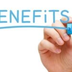 Hand holding a marker writing "BENEFITS" on a whiteboard, emphasizing leak detection advantages by Zing Plumbing.