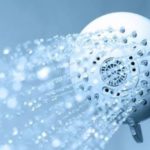 Round showerhead spray with multiple nozzles, showcasing plumbing services by Zing Plumbing in Tucson.